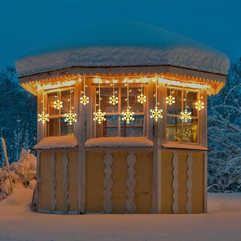 LUCES DECORATIVAS NAVIDEÑAS CORTINA DE LUZ LED AMARILLA CON DISEÑO DE COPO DE NIEVE 18.5X11X18.5CM