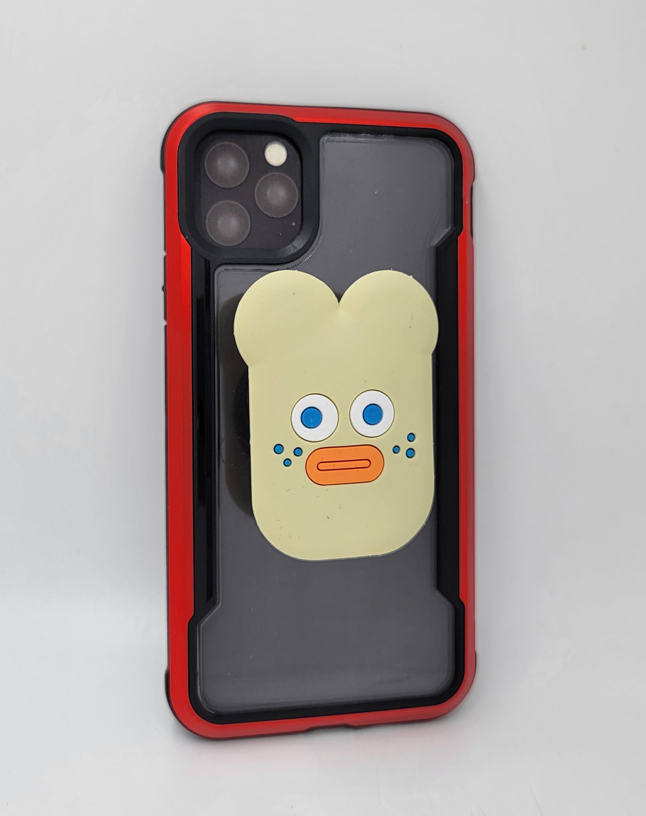 SOPORTE PARA CELULAR EN FORMA DE CARITA 7CM