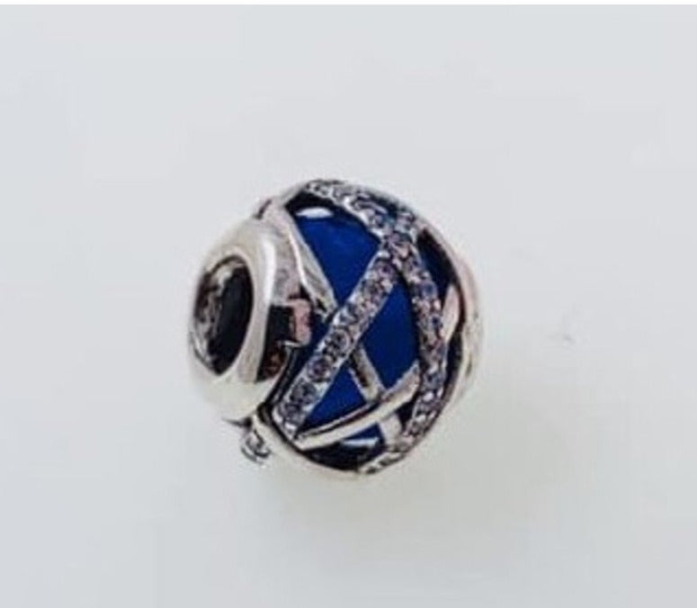 PCHARM1676 CRISTAL AZUL CON CUENTAS AL REDEDOR