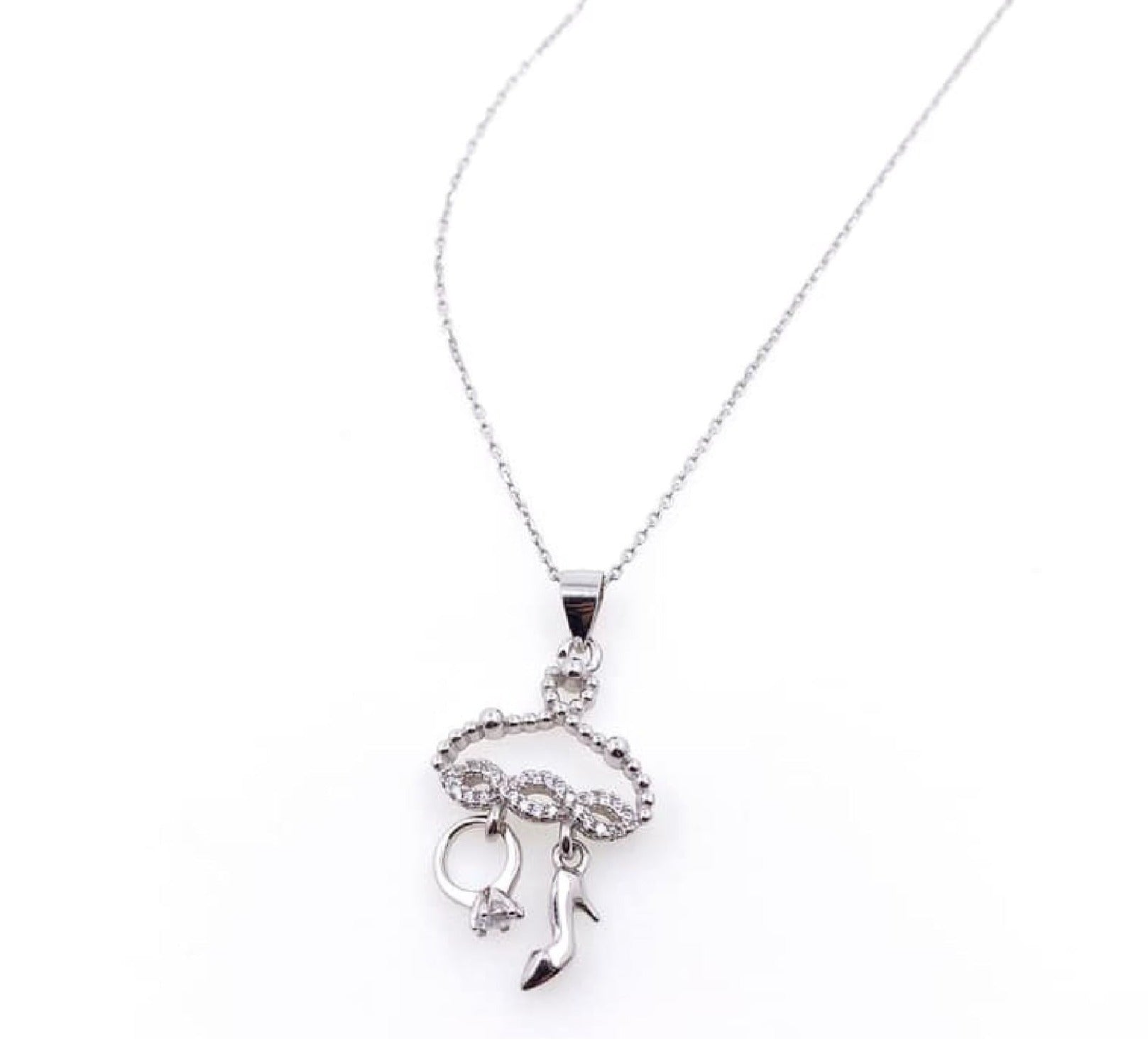 PDIJE1269 CIRCONES TRANSPARENTES, ANILLO Y TACON, INCLUYE CADENA PLATA 925