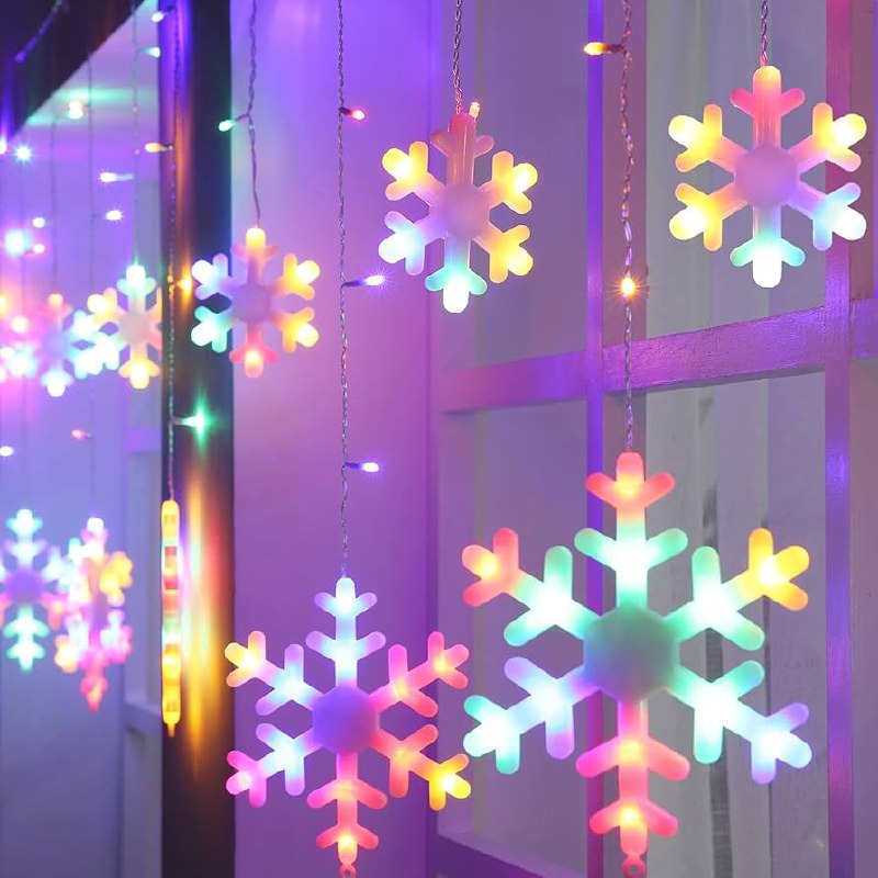 LUCES DECORATIVAS NAVIDEÑAS CORTINA DE LUZ LED MULTICOLOR CON DISEÑO DE COPO DE NIEVE 18.5X11X18.5CM