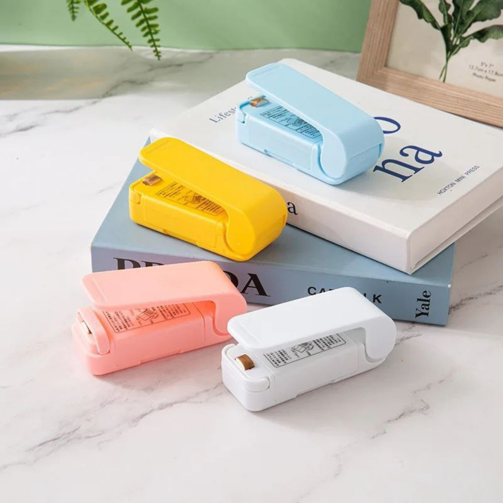 MAQUINA MINI SELLADORA DE BOLSAS DE ALIMENTOS