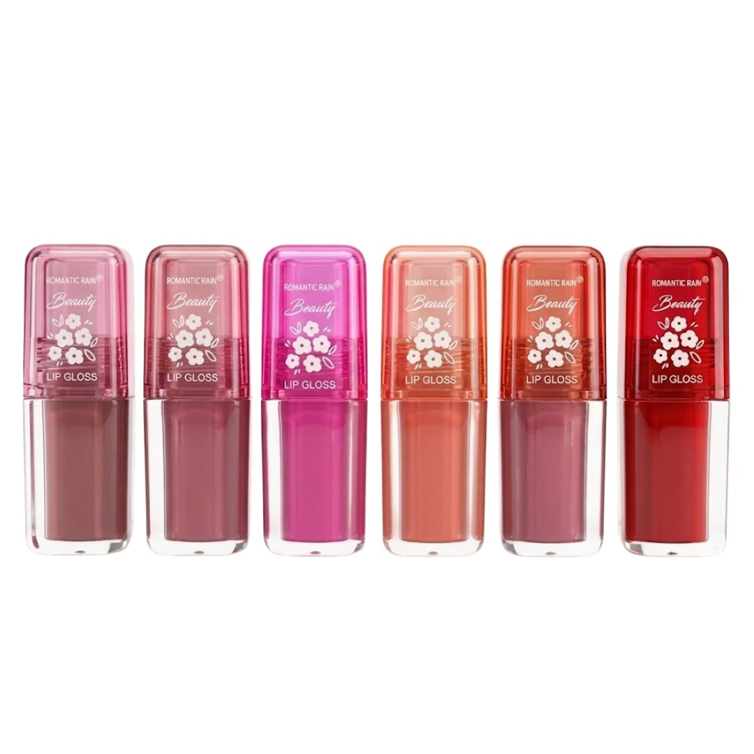 BRILLO LABIAL CON BASE LIGERA NUTRITIVA E IMPERMEABLE ROMANTIC RAIN (DUPE DE HUDA BEAUTY)