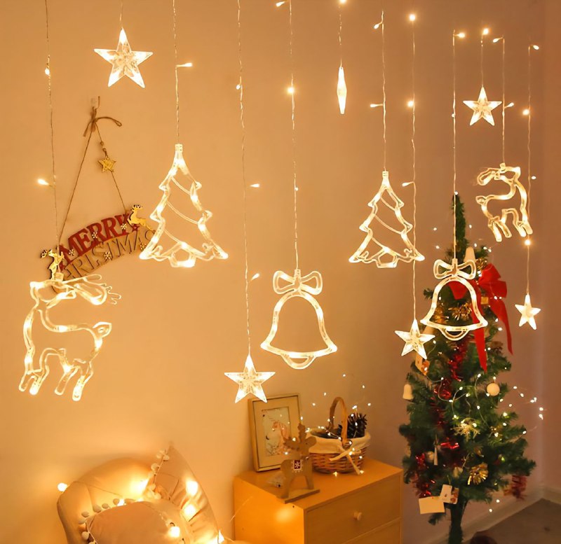 LUCES DECORATIVAS NAVIDEÑAS CORTINA DE LUZ LED DE 107 LUCES CAIDAS EN FORMA DE ESTRELLA, RENO, ARBOL Y CAMPANA, CON CAMBIOS DE LUZ AMARILLA ACOGEDORA 18.5X11X18.5CM