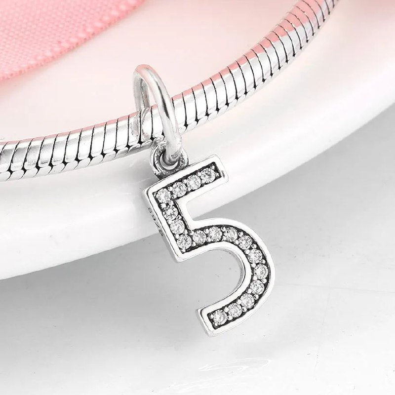PCHARM4065$5 NUMERO 5 PANDORA PLATA 9.25