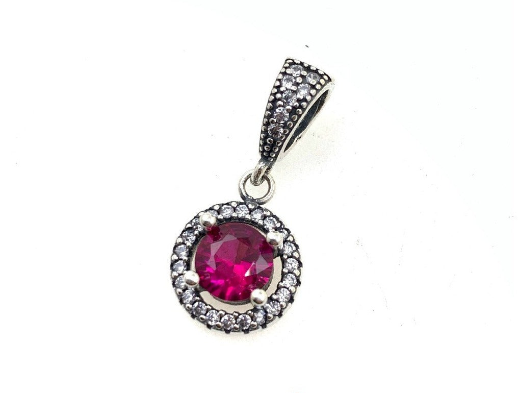 PCHARM2549#1  COLGANTE CIRCULAR CON CIRCON FUCSIA EN MEDIO