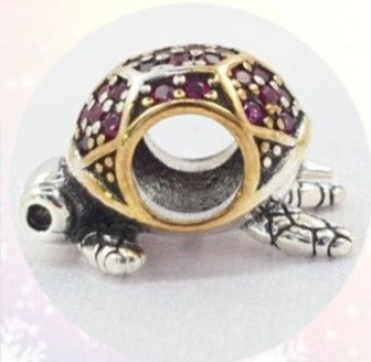 PCHARM2670  TORTUGA CON CIRCONES AZULES Y ROJOS